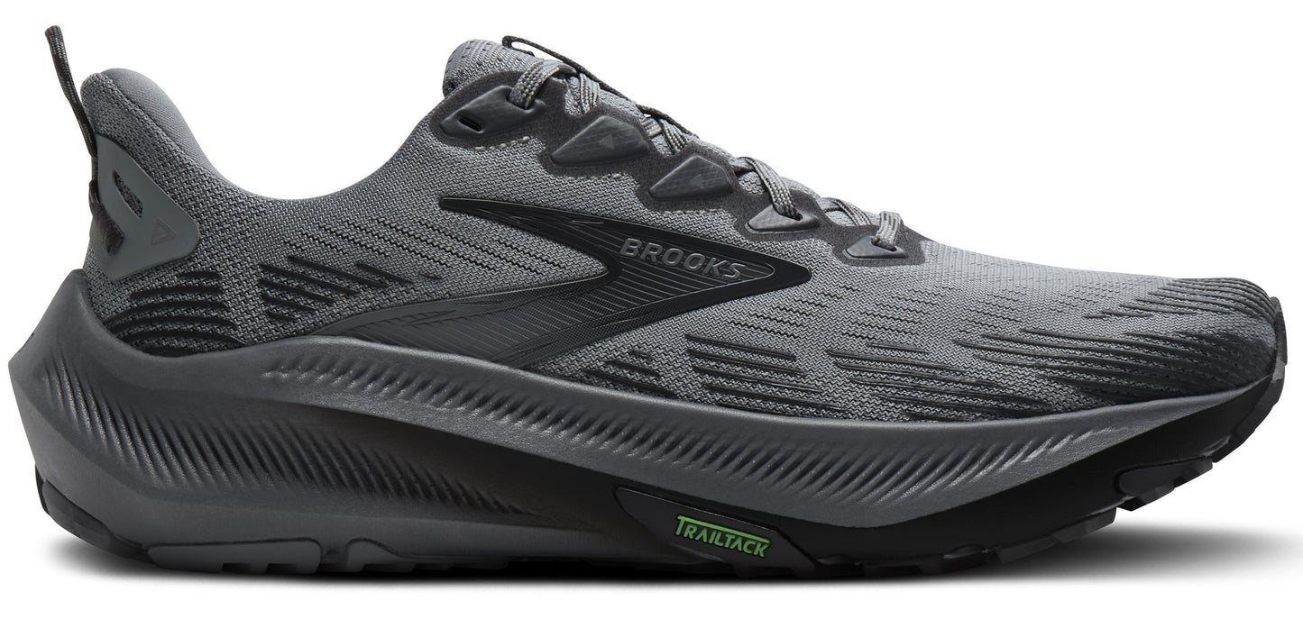 A gray running shoe with a curved sole.