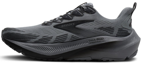 Gray running shoe with gray laces and a thick, black sole. The side of the shoe has a stylized BROOKS logo.