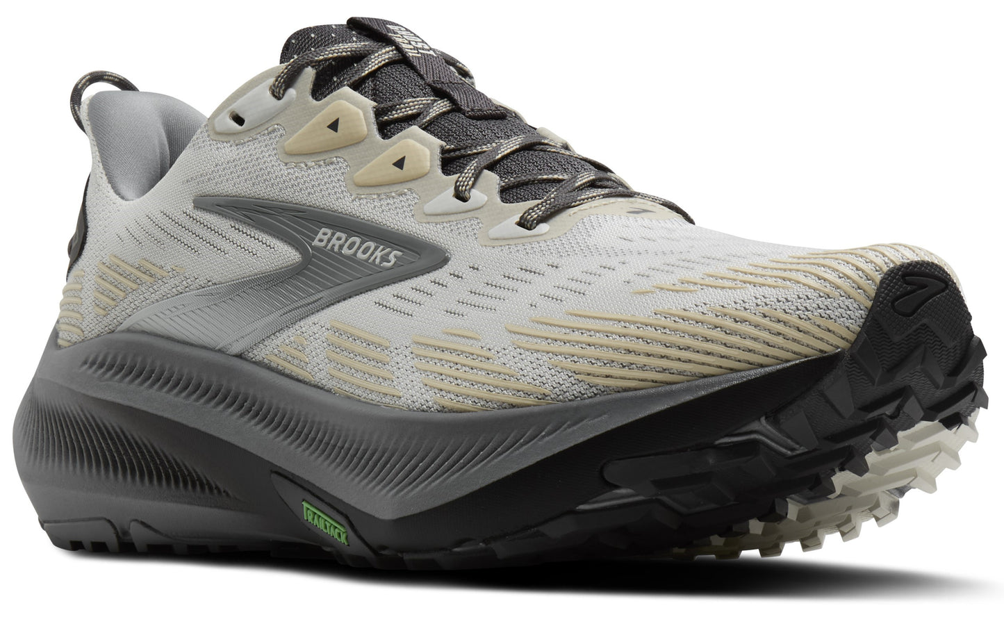 A running shoe has a gray sole and white upper with gray laces and a pull-tab on the heel. 'BROOKS' is printed on the side.