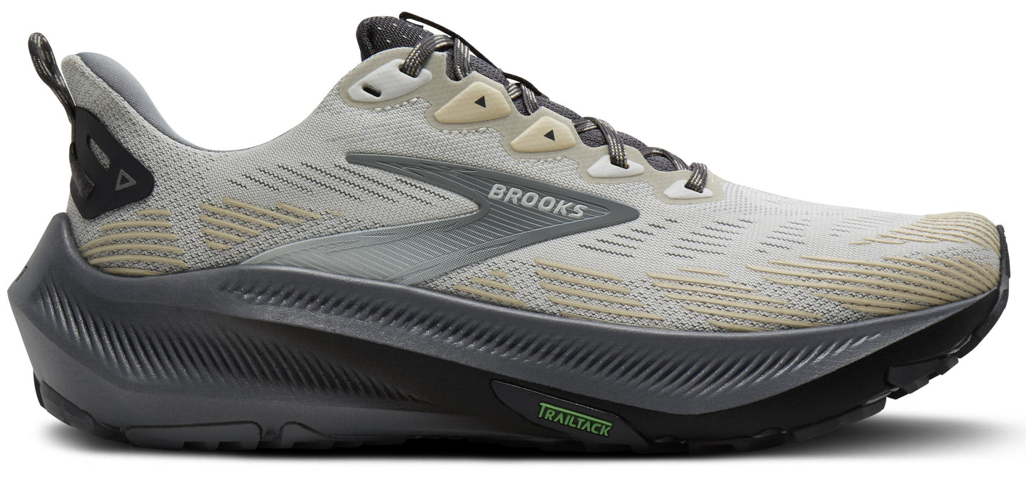 A gray running shoe with the word "BROOKS" on the side.