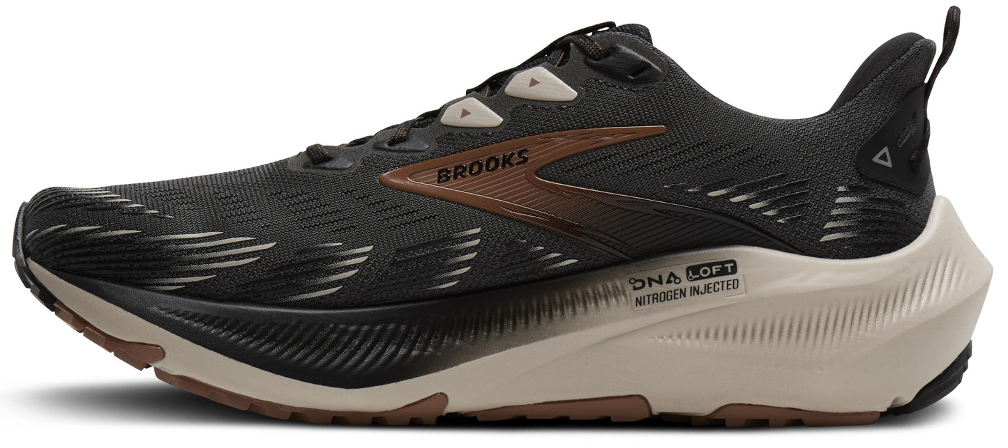 A dark-colored running shoe with a tan sole and a brown logo that says BROOKS.