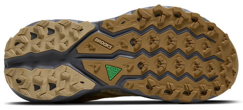 sole of a shoe with Brooks logo and a green triangle with textured design