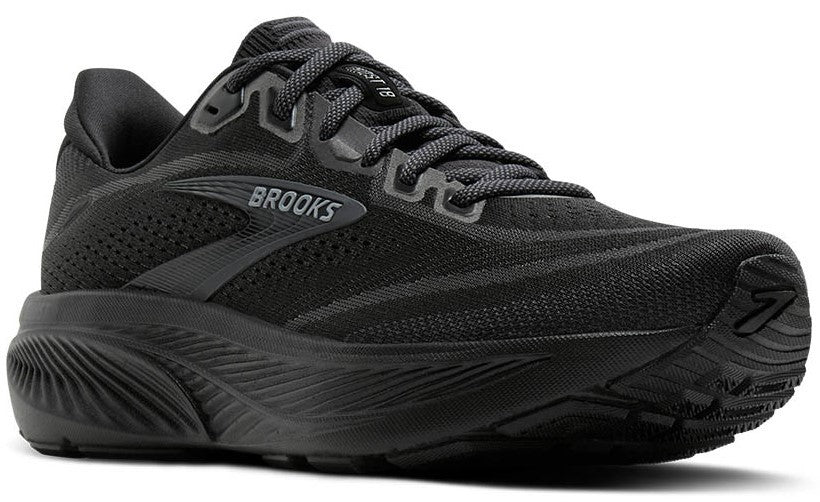 Black running shoe with dark laces, thick sole and "BROOKS" printed on the side.