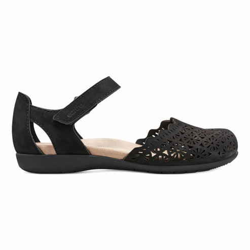 Black Mary Jane style shoe with patterned toe and velcro strap.