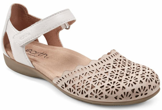 A women's off-white Mary Jane shoe with cutouts and an ankle strap.