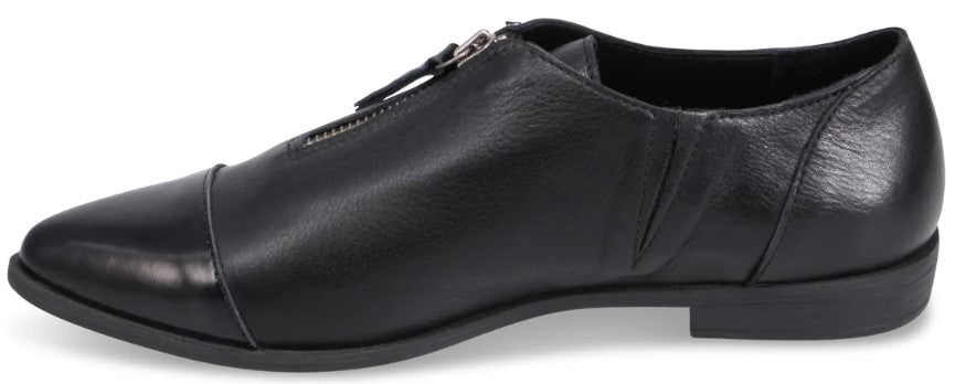 A black leather Oxford-style shoe with a front zipper closure, a cap toe, and a low block heel.