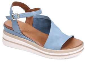 Light blue platform sandal with an ankle strap and tan insole.