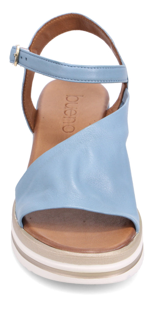 Light blue sandal with ankle strap and platform sole.