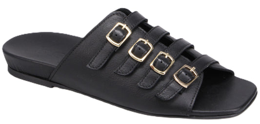 A black slide sandal featuring three straps, each adorned with a gold buckle.