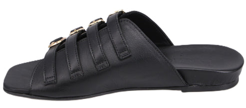 A black sandal with triple straps and gold buckles.