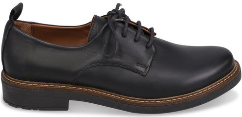 A black leather derby shoe with brown stitching along the welt and a thick black sole.
