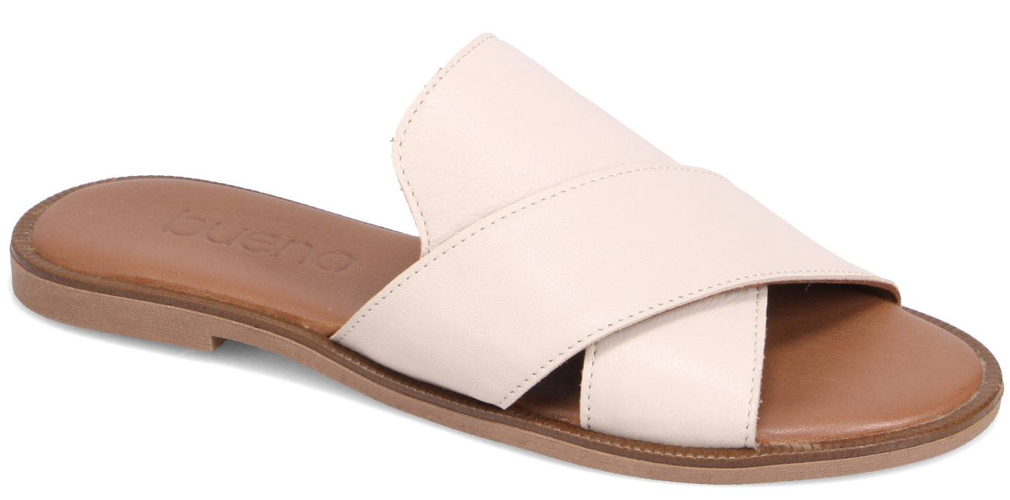 A beige leather sandal with a cross-over design.