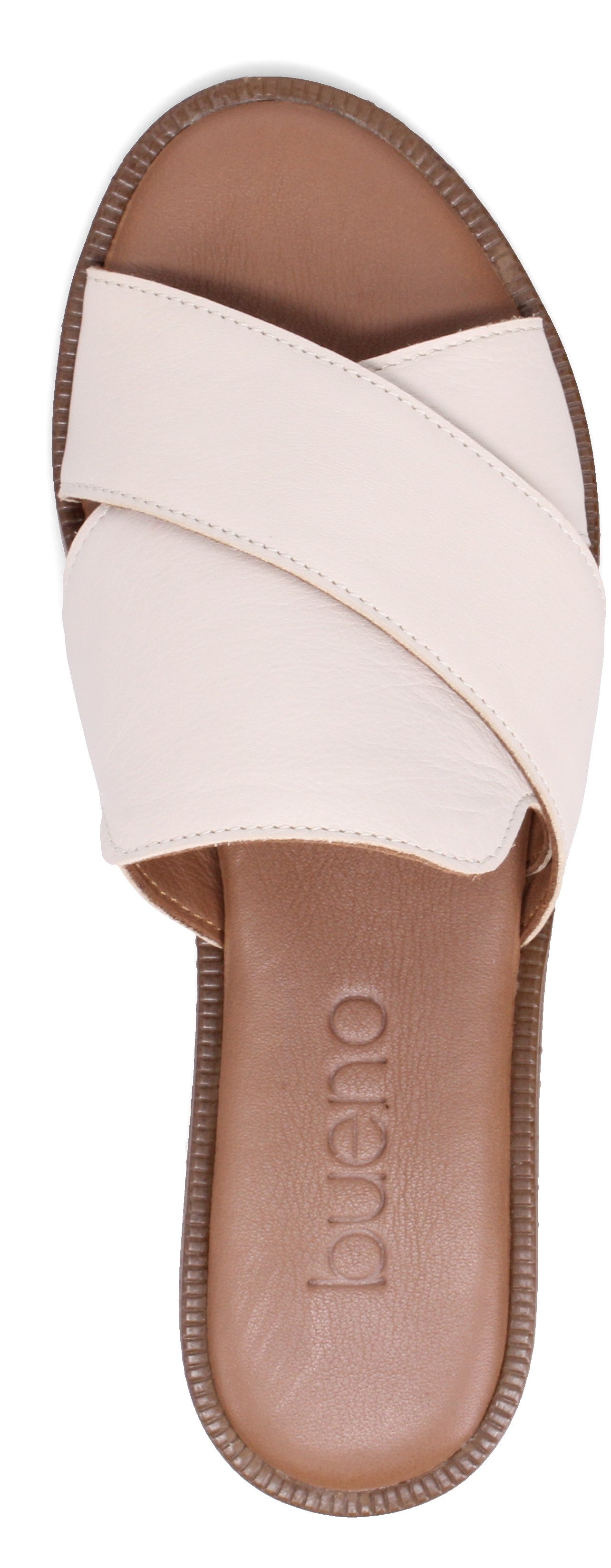 A sandal with crossing straps and the word 'bueno' on the insole.