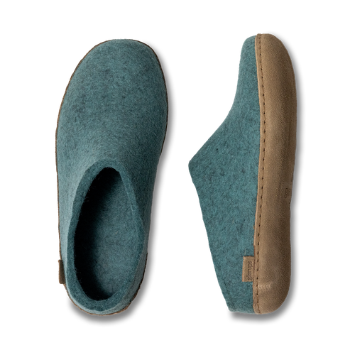 Two teal, felt, house slippers, one shows the top and inside, the other shows the side and sole.