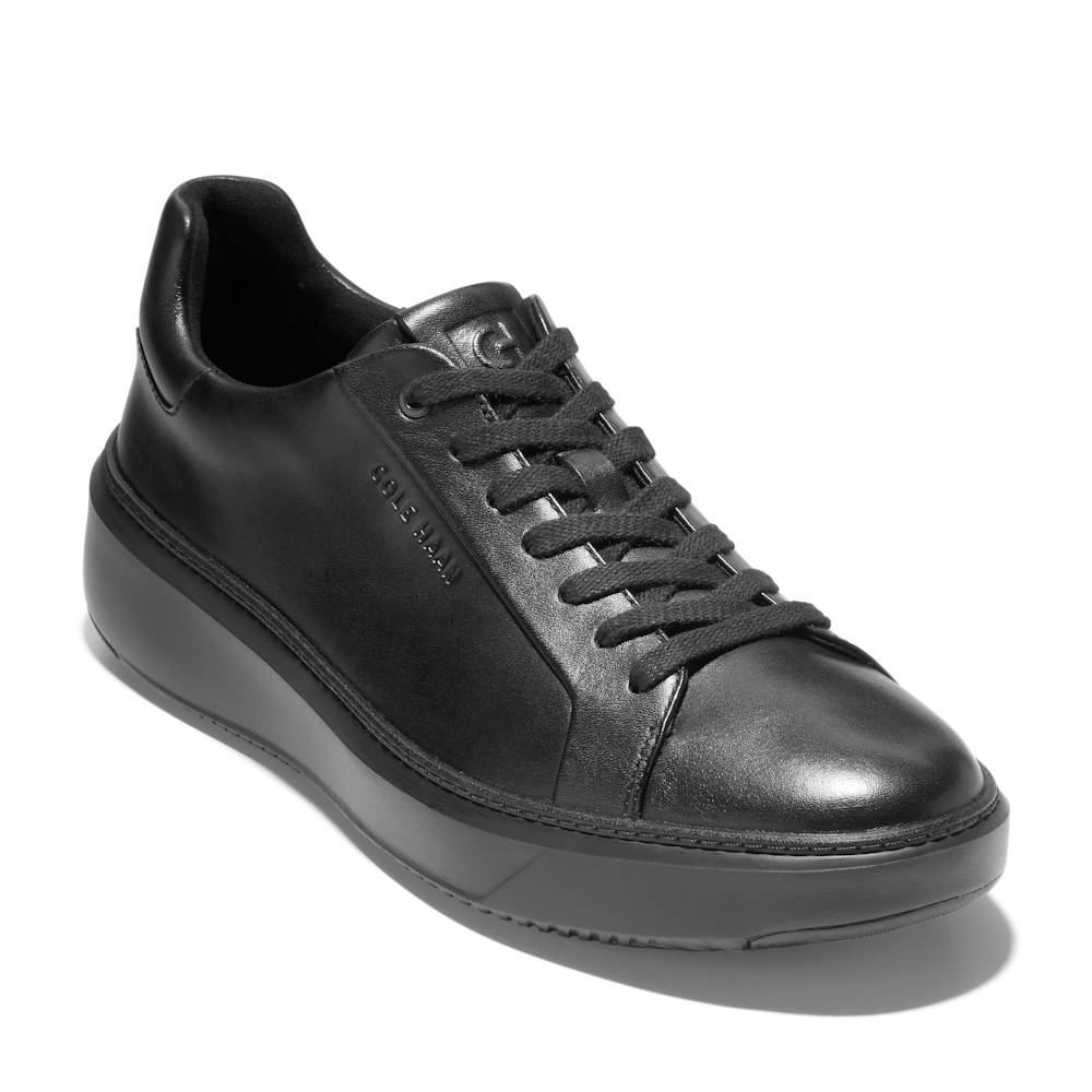 Black leather sneaker with black laces.