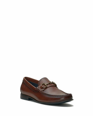 Brown leather loafer with metal buckle.