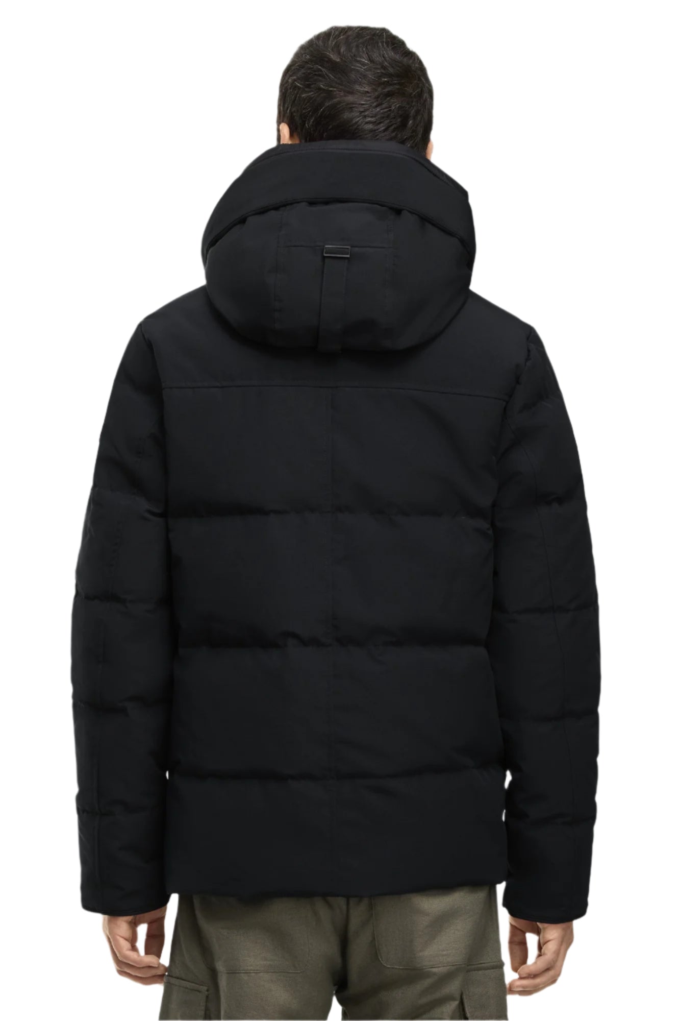 Back view of a black, puffy hooded jacket worn by a person.