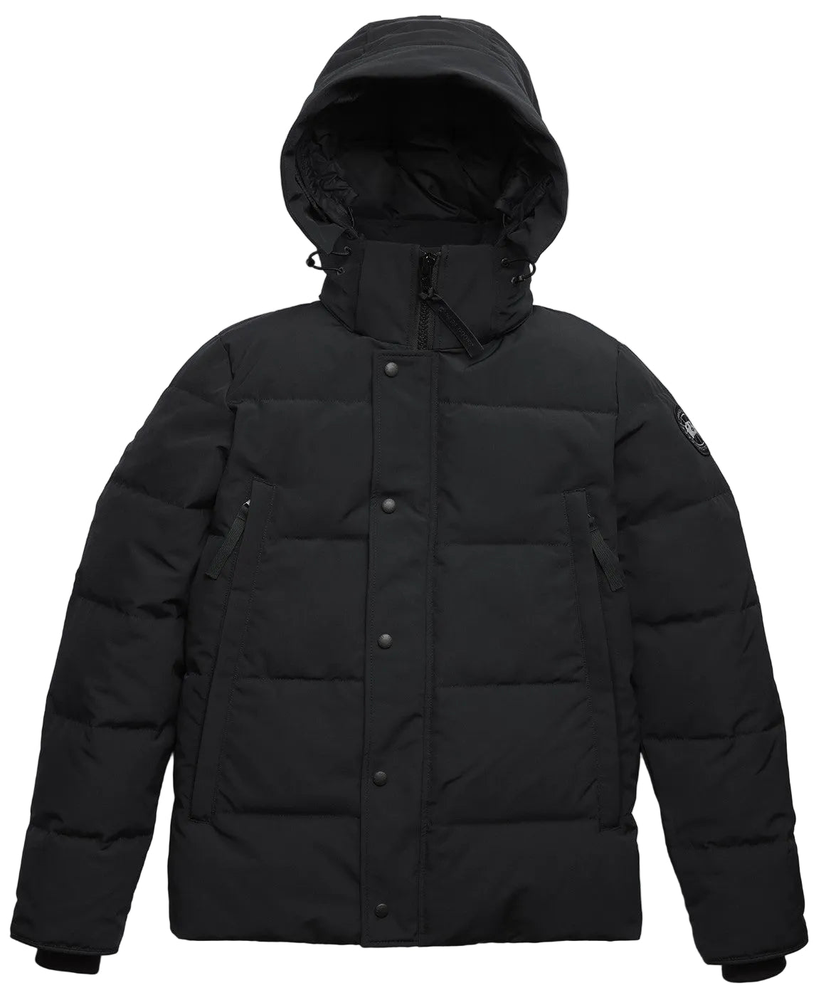 A black, hooded, down-filled puffer jacket with a front snap-button placket covering the zipper, long sleeves with ribbed cuffs, and a small circular logo patch on the left upper sleeve.