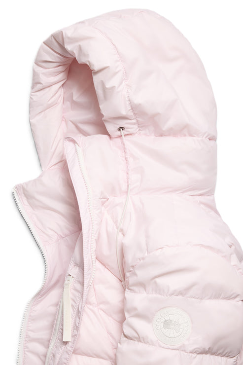 Close-up of a light pink hooded down jacket.
