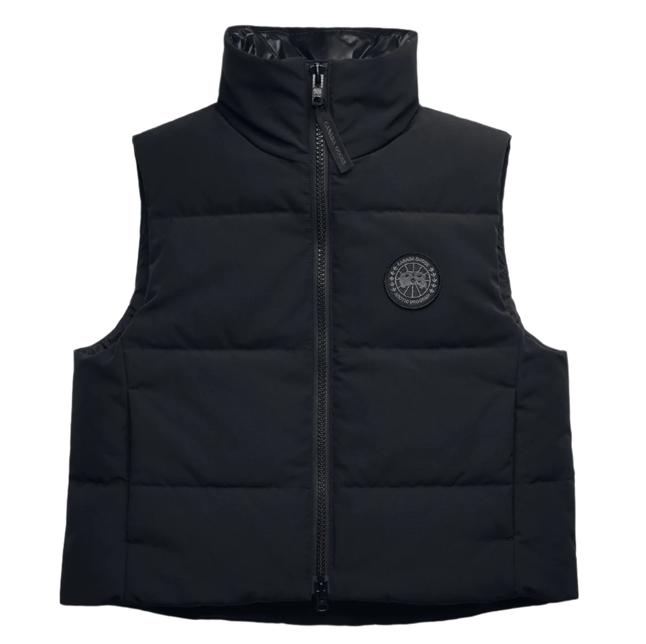 Black puffy vest with zippered front and a round logo on the right chest