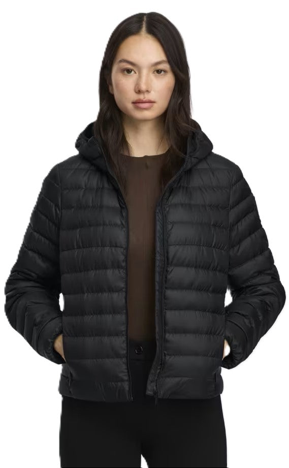 A woman in a black hooded, puffy jacket.