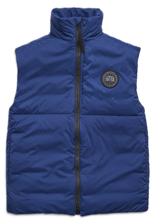 A puffy, sleeveless, royal blue jacket with a vertical zipper and an emblem.
