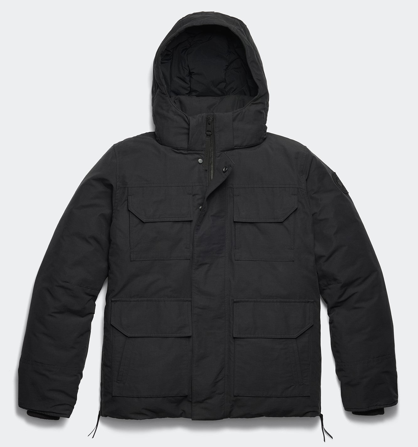 Black hooded winter coat with multiple pockets.