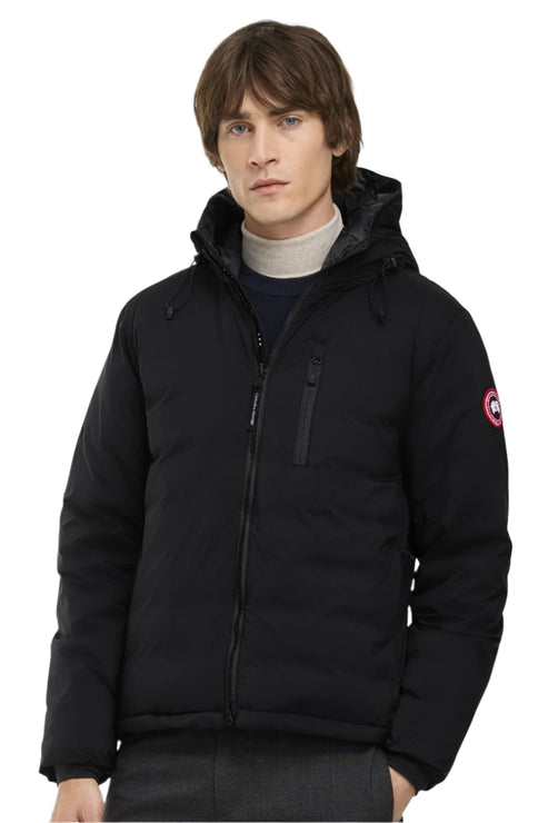 Black down puffer jacket with a hood and logo on the sleeve.