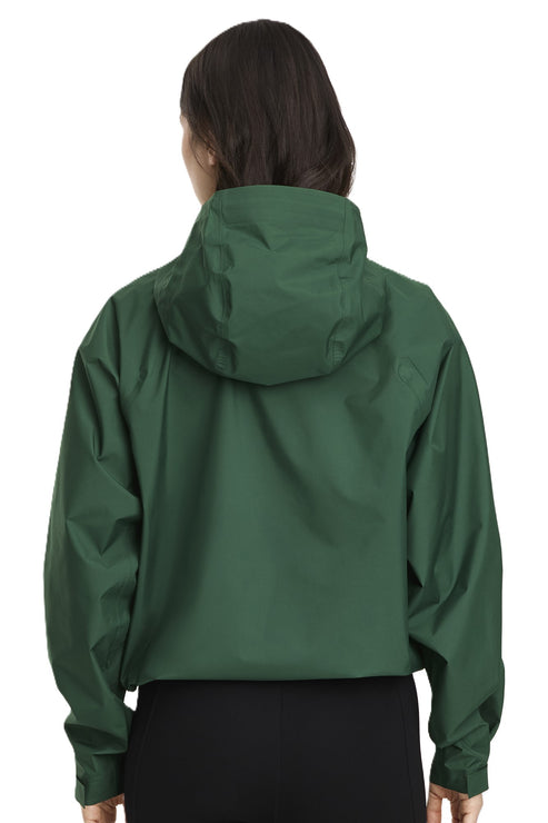 A back shot of a person wearing a green hooded rain jacket.