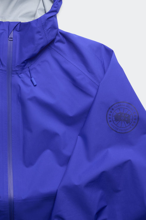 Close-up of a purple rain jacket sleeve featuring the logo on the sleeve, with a hood and zipper.