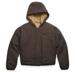 Brown hooded jacket with SHERPA lining and a dark inscription.