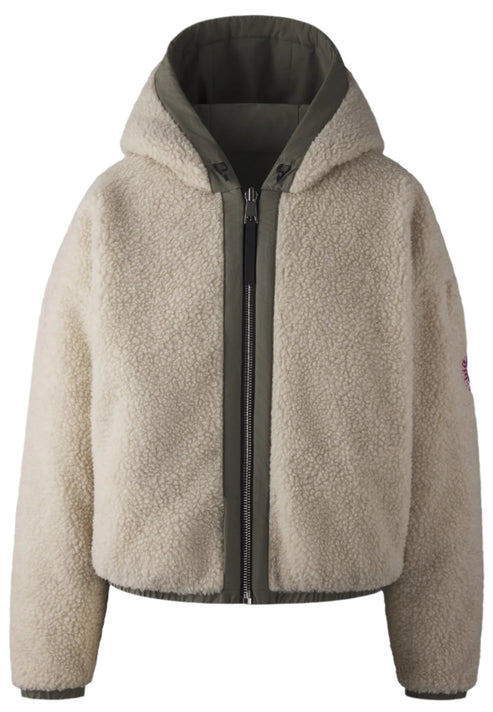 Beige sherpa fleece hooded jacket with olive green trim and zipper.