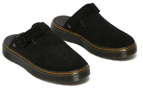 Two black suede clogs with adjustable straps and yellow stitching around the sole.