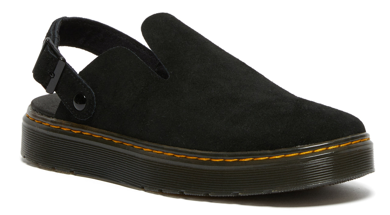 Black, low, back-strap shoe with a dark sole and visible yellow stitching.