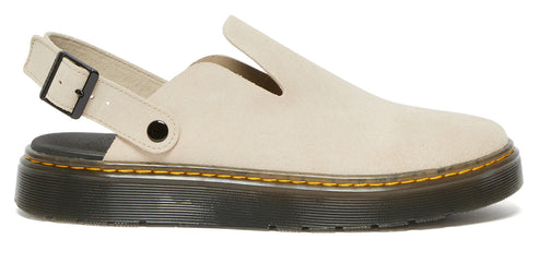 A light-colored leather clog with a black sole and adjustable back strap.