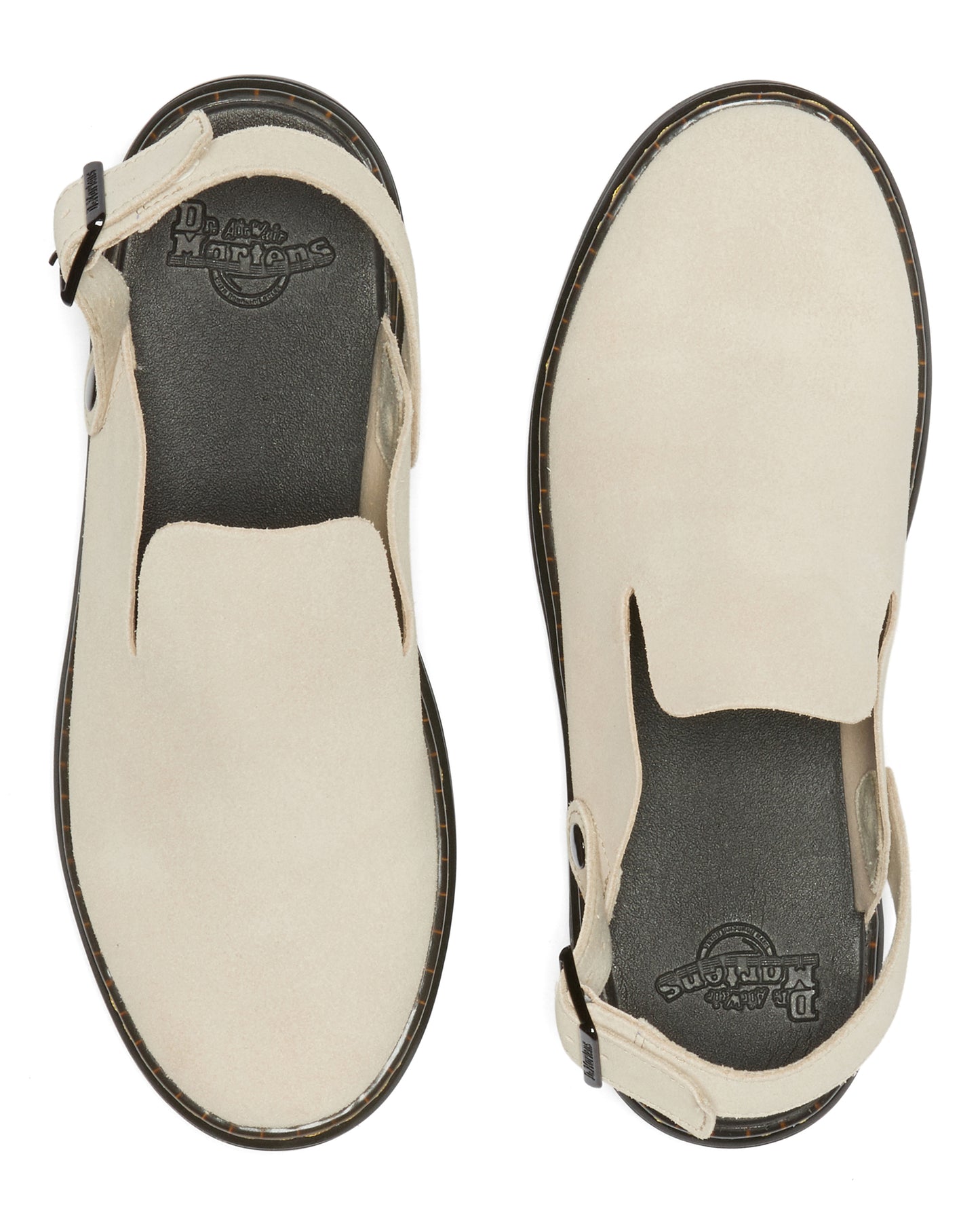 Overhead view of a pair of off-white leather sandals with slingback straps and black soles; the insole is branded with visible text.