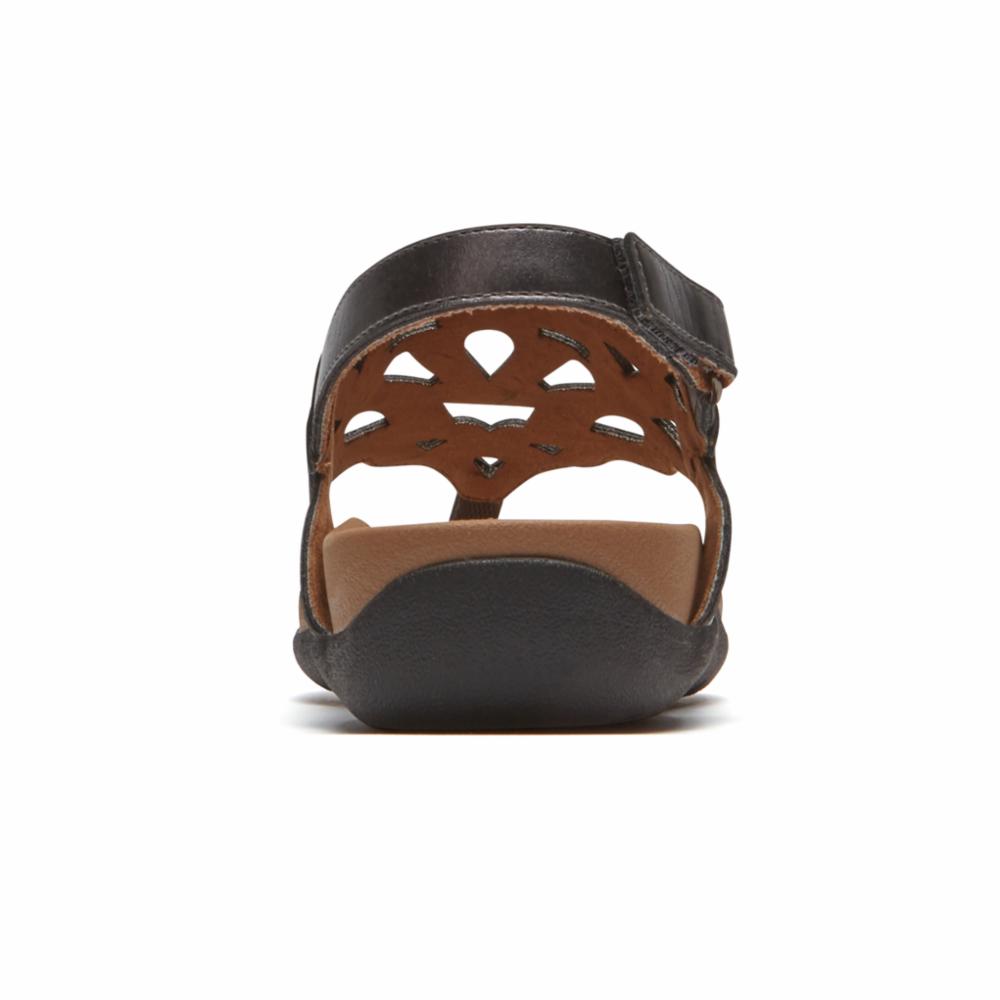 Black sandal with cut out design.