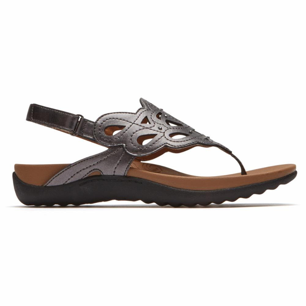 Silver sandal with thong toe and slingback strap, featuring cut-out detailing.