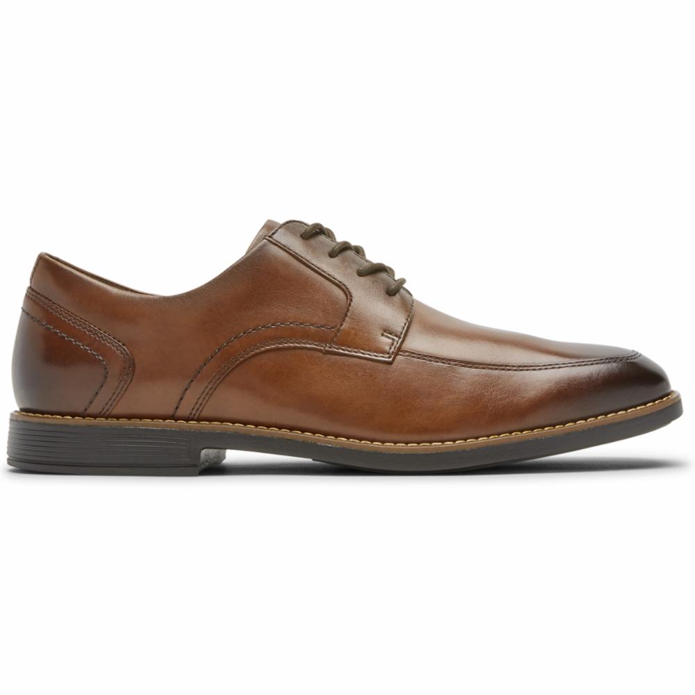 Men's light brown leather dress shoe with a lace-up closure and a dark brown sole.