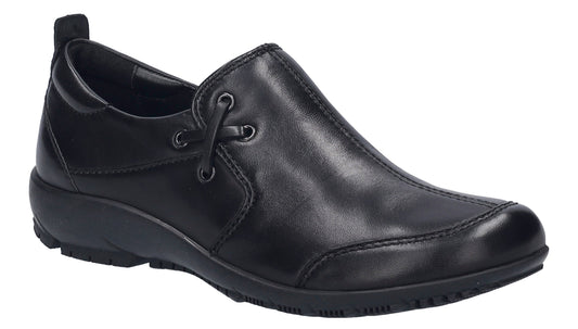 A black slip-on shoe with a rounded toe and a low heel.