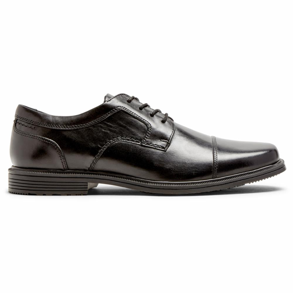 Black leather cap-toe dress shoe with lace-up closure.