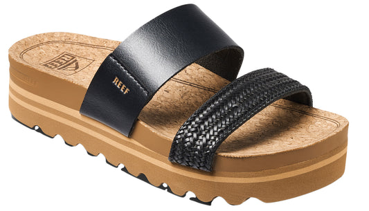Platform sandal with cork insole, one plain black strap and one braided black strap.