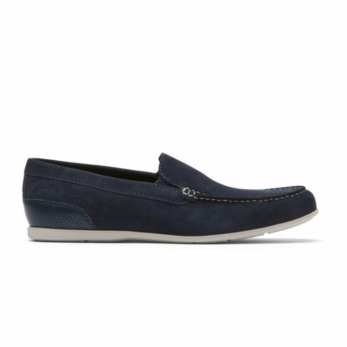 Navy suede loafer with contrast stitching and patterned heel.