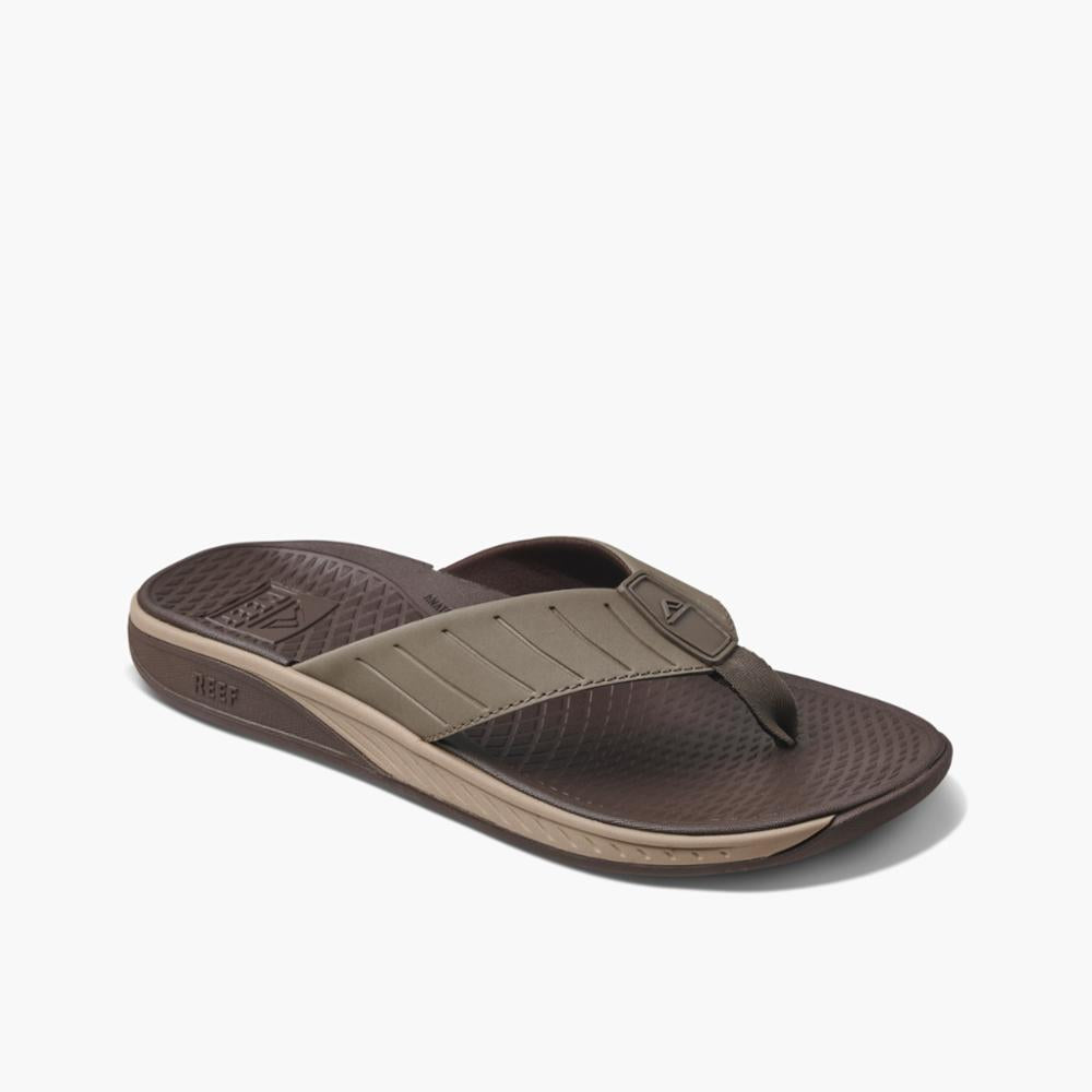 Brown and beige sandal with a brown toe divider.