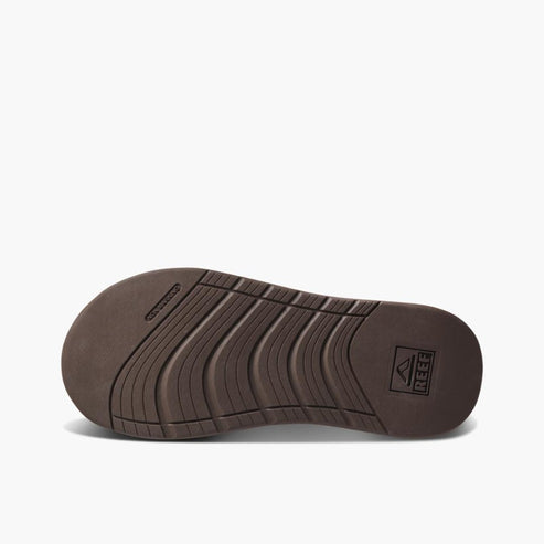 Brown sandal sole with ribbed design.
