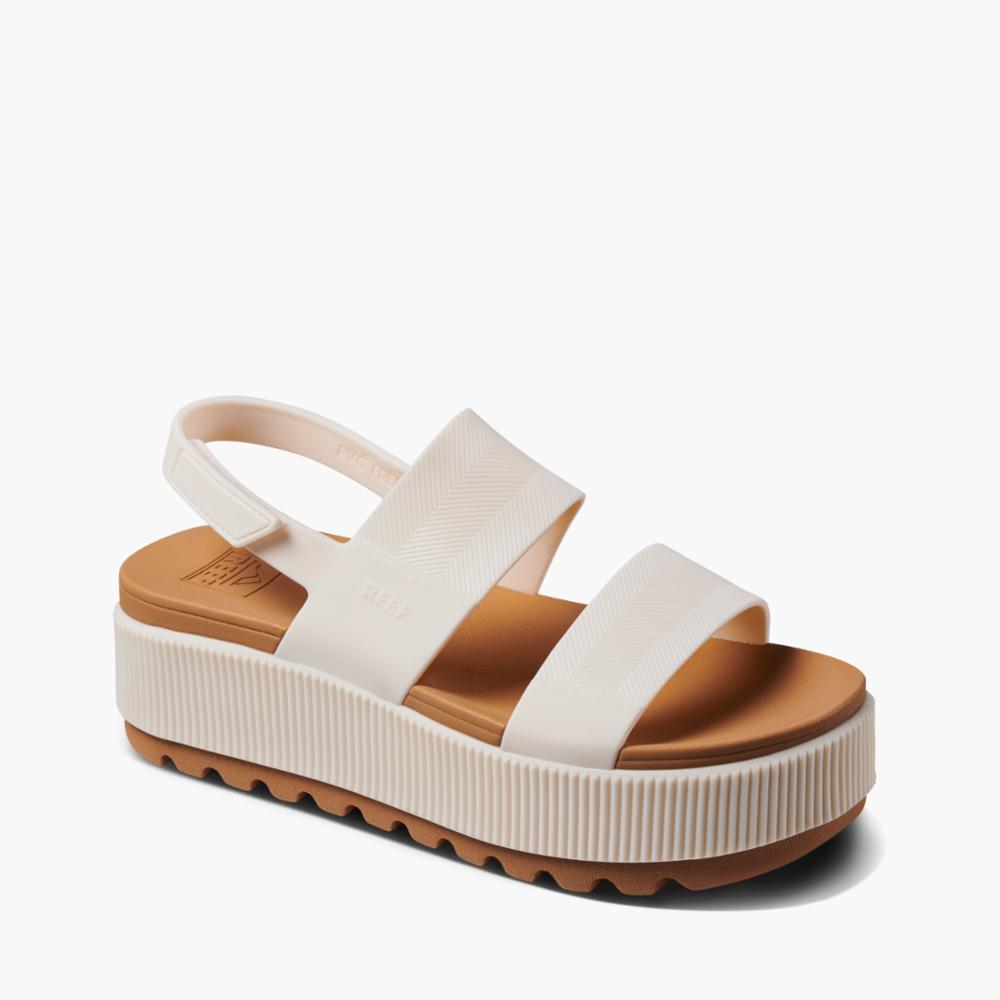 Beige platform sandal with two straps and back strap.