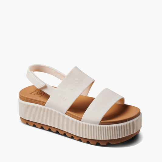 Beige platform sandal with two straps and back strap.