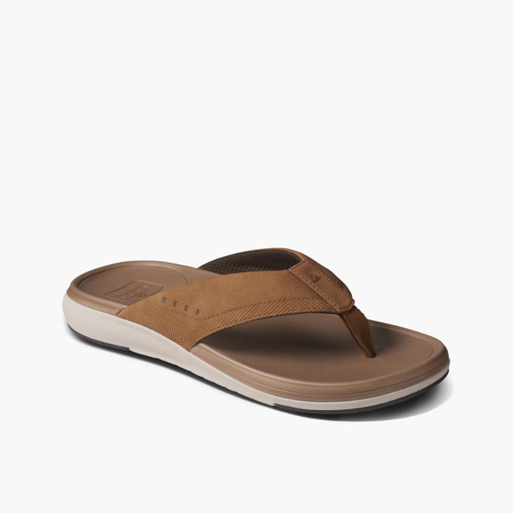 Brown flip-flop with neutral sole and soft straps.