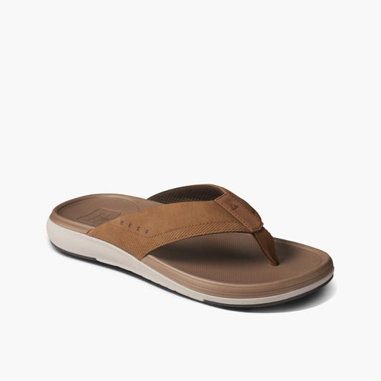 Brown flip-flop with neutral sole and soft straps.