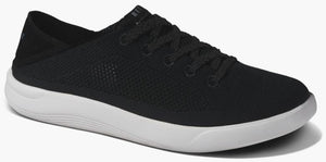 Black sneaker with white sole and black laces.